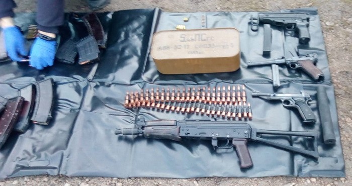 Небезпечна знахідка: у херсонця в гаражі виявили зброю та боєприпаси
