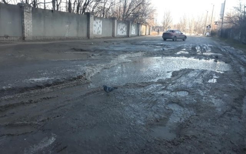 У Херсоні довгоочікуваний ремонт дороги по вулиці Паровозної призупинено, - ВІДЕО